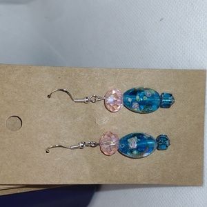 Oblong lampwork bead with pink flowers